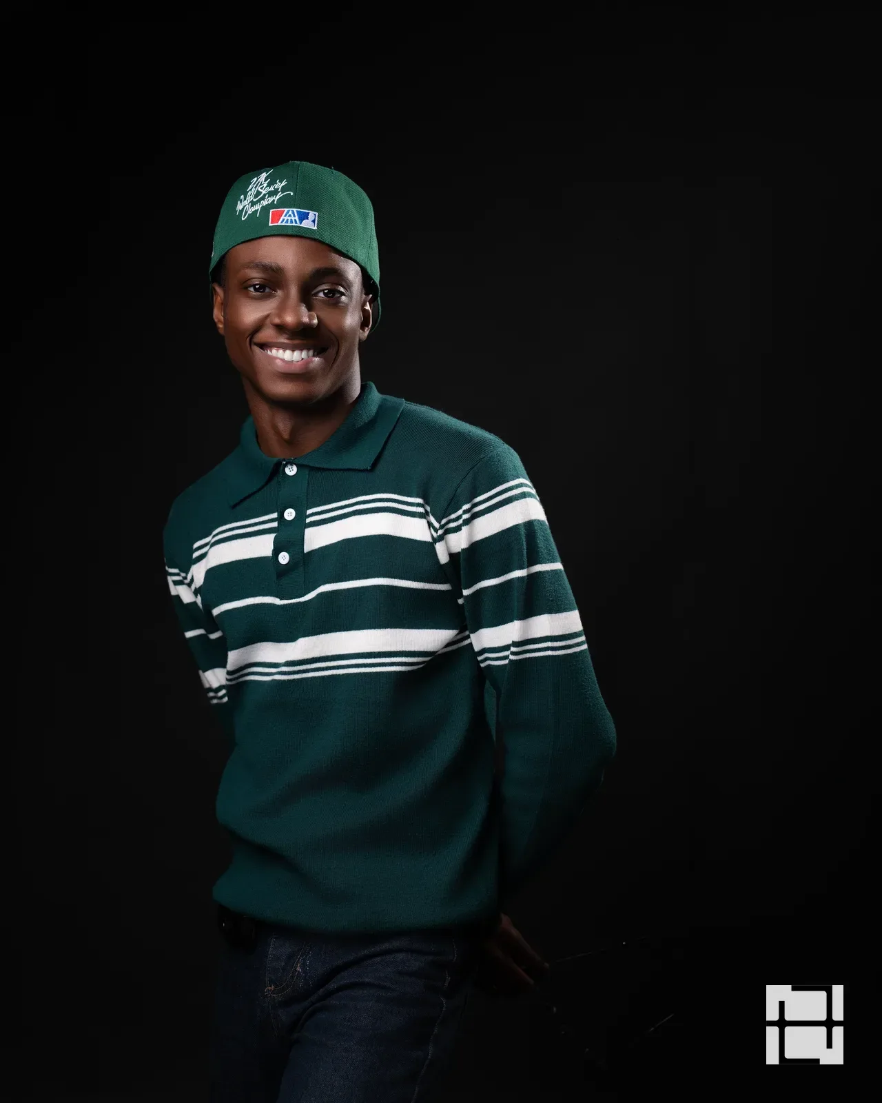 Jerry Onwuka in a green striped polo